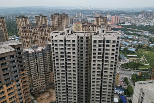 China new-home prices barely fall in sign market is stabilizing